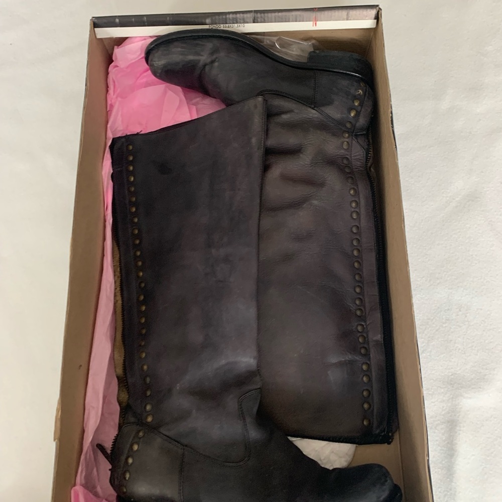 - Black leather tall riding women’s boots